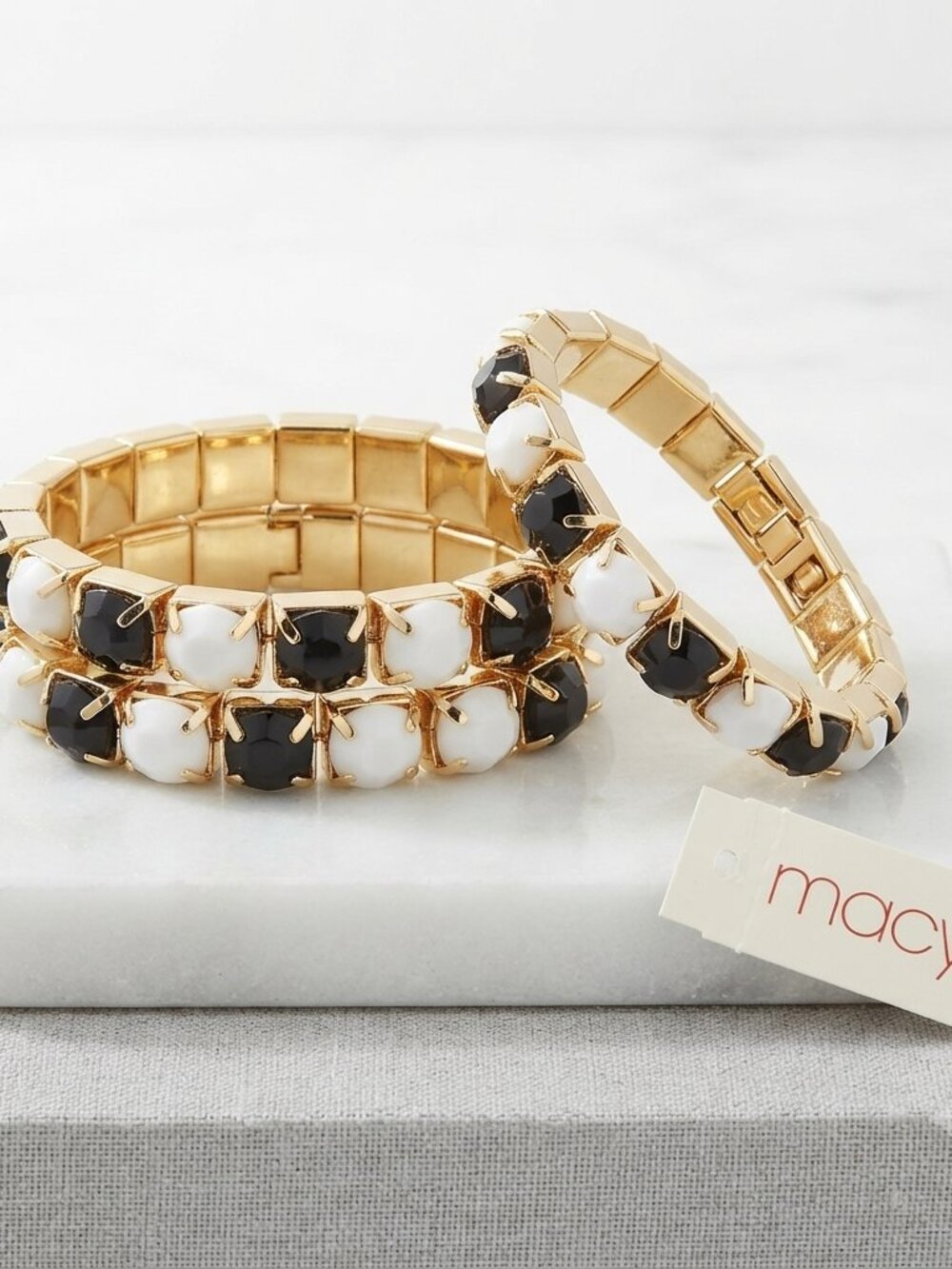 Macy’s 3-Piece Gold-Tone Stretch Bracelet Set with black/white faceted stones